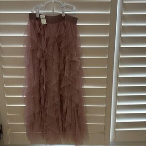 Anthropologie tulle skirt in light pink, size small.